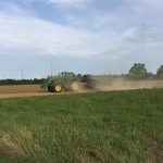 Tractor working in field